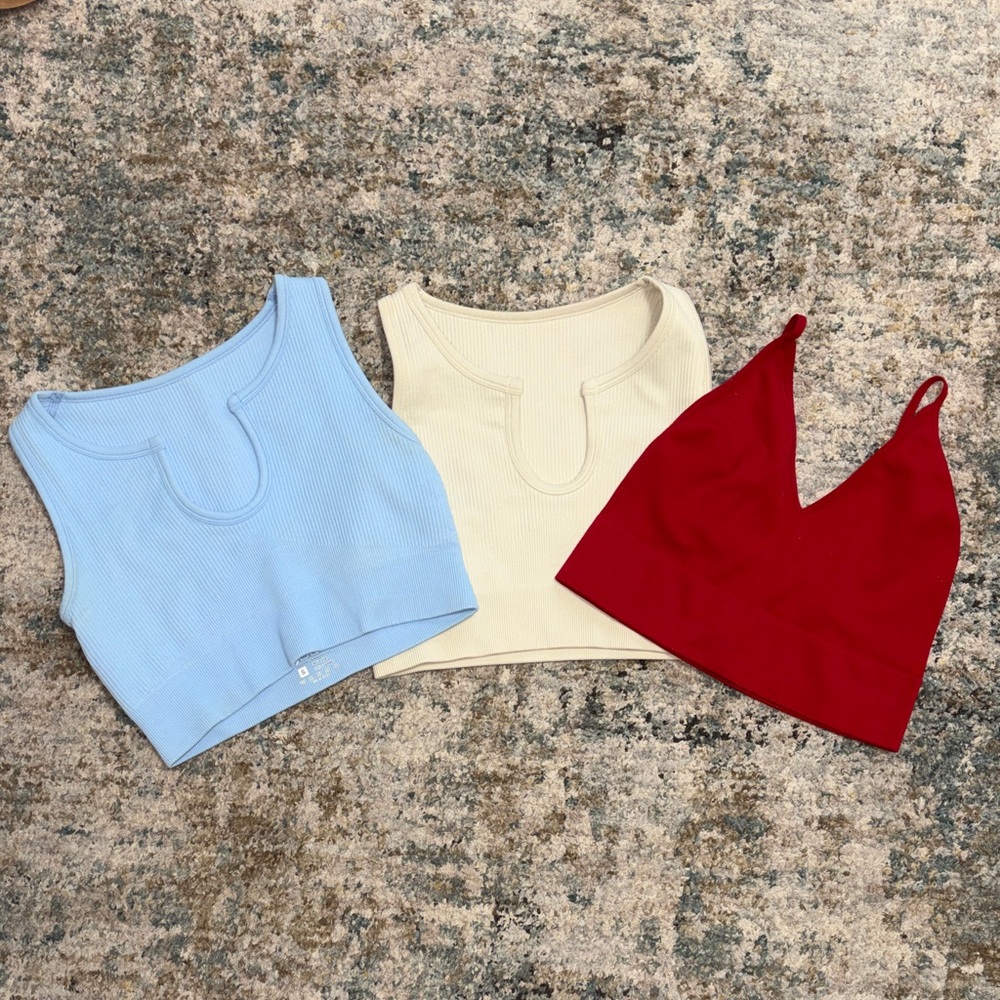 Set of Three Sport compression Tops in Blue, Cream, and Red